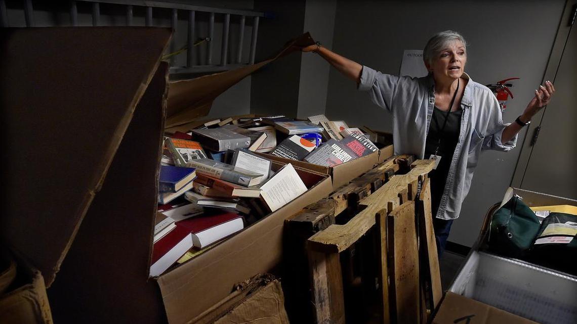 
Sylvia Stucky, a volunteer for Friends of the Kansas City Public Library, lamented the thousands of books destined for the shredder as Central Library goes through an accelerated book-culling process and makes room for reconfigurations and upgrades. Volunteers are trying to sort through, save and find new homes for as many books as they can.
