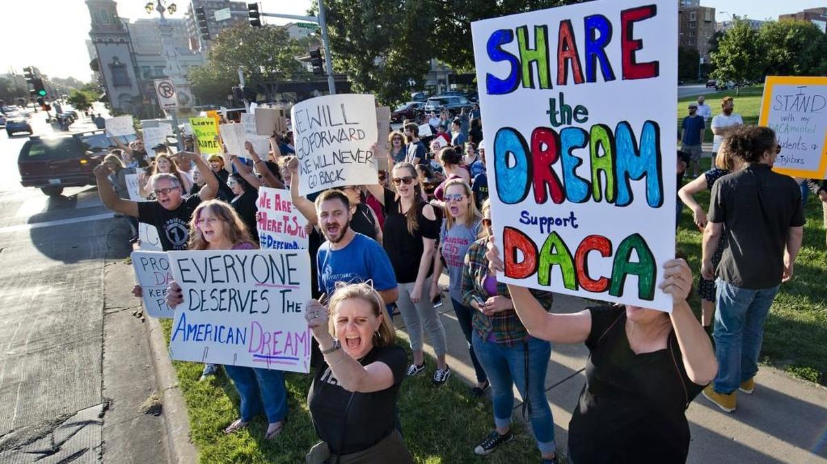 DACA supporters protested President Donald Trump's executive action ending the Obama-era program on Tuesday evening, Sept. 5, 2017, at the J.C. Nichols Fountain.