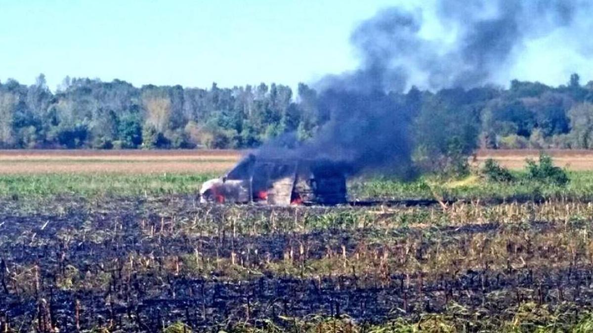 
A van loaded with live ammunition burned in a field in Clay County on Tuesday after a man failed to put out a garbage fire by driving over it. 
