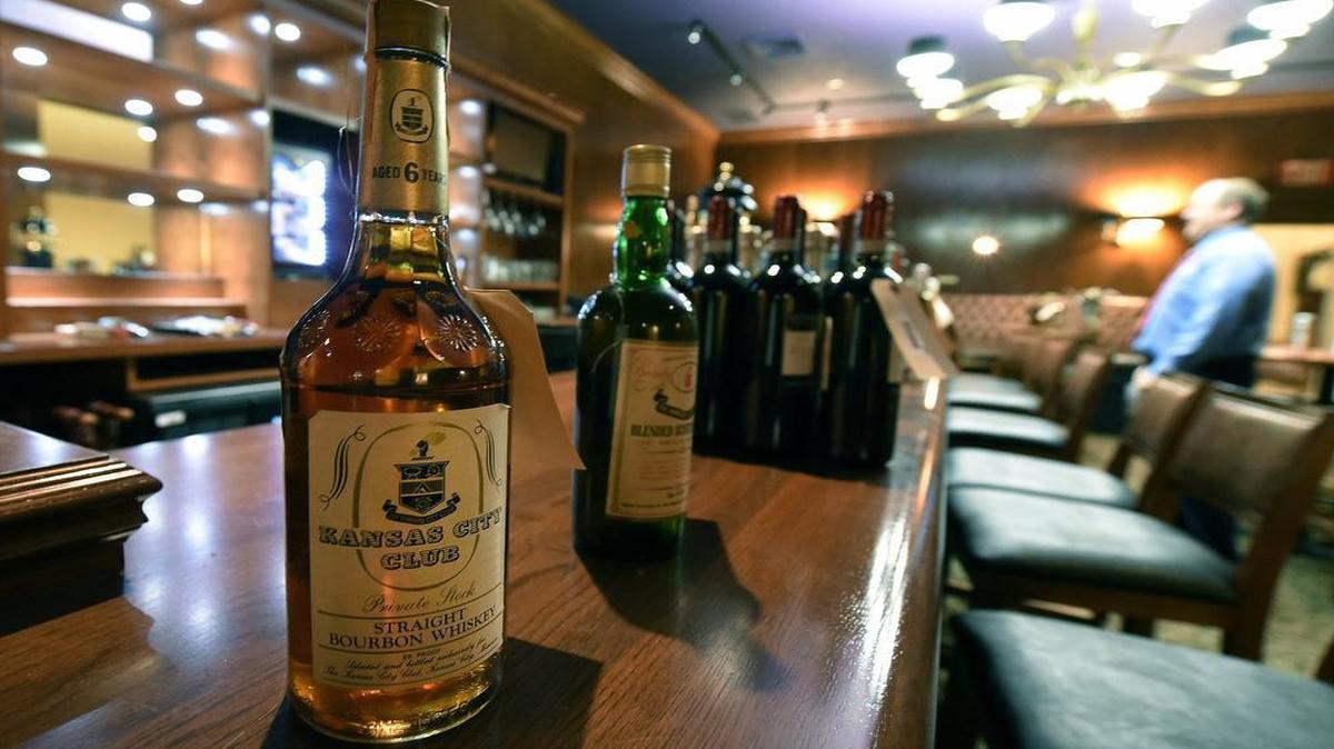 
Bottles of liquor with Kansas City Club labels are among the scores of items up for auction after the 133-year-old club declared bankruptcy and padlocked its doors in May. 
