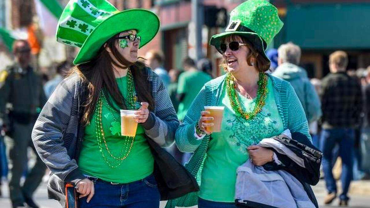 St. Patrick’s Day celebrations are returning to the Kansas City metro area after a hiatus due to the pandemic. In this file photo, Tara Glenn (left) and her mother Rene Bennett, both of Lee’s Summit, celebrate St. Patrick’s Day on Tuesday, March 17, 2015 in Westport.