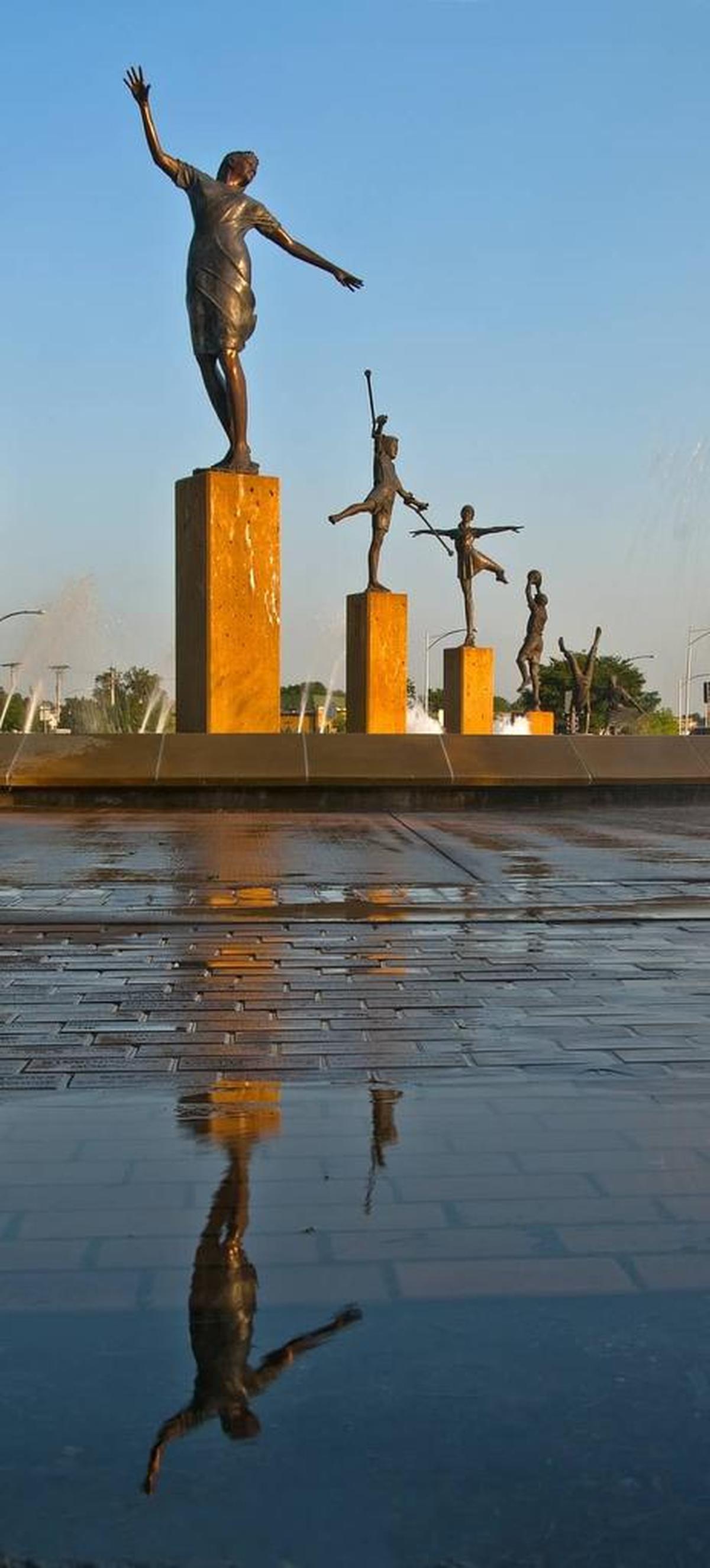 The columns of the Children’s Fountain each were topped with a playful bronze sculpture by artist Tom Corbin.