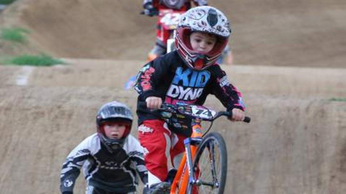 
Five-year-old Blake Mathis (in the front) of Lee’s Summit makes  a practice  run during motocross racing at Blue Springs BMX.
