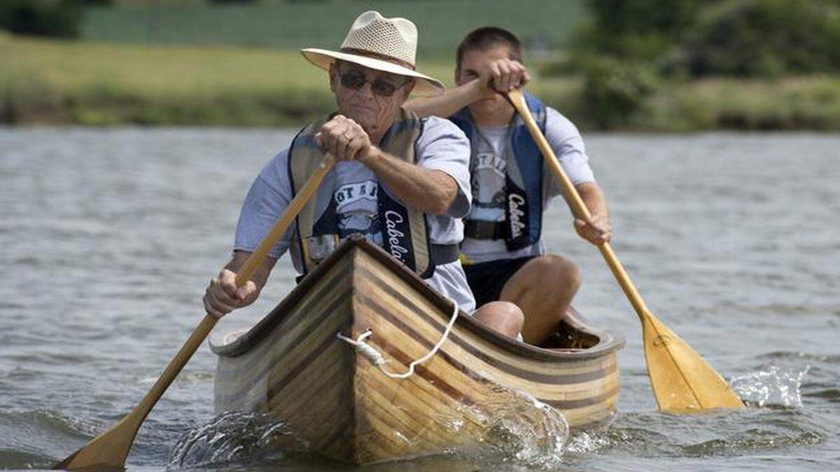 
Ken Wodrich of Concordia, Mo., handcrafted a wooden canoe over the winter and plans to race with his grandson, Keton Schroeder, in the Missouri River 340. Last week they practiced on a city lake south of Concordia.
