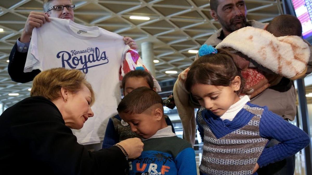 The U.S. ambassador to Jordan, Alice Wells, met with Syrian refugee Ahmad al-Abboud and his family Wednesday at the airport in Amman, Jordan.