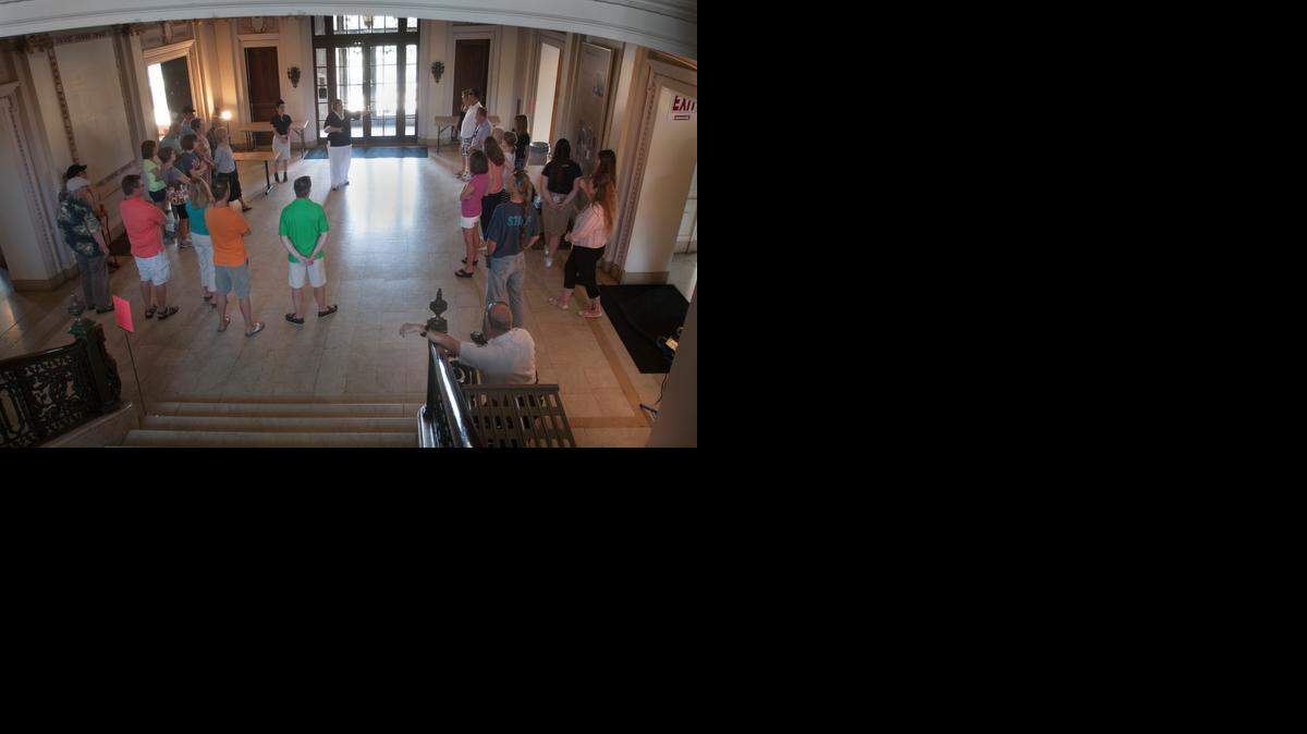 
Denise Morrison, director of collections and curatorial services at the Kansas City Museum, led a hardhat tour of Corinthian Hall, the former home of Robert A. Long, Sunday. Visitors got to see hall mid-renovation.
