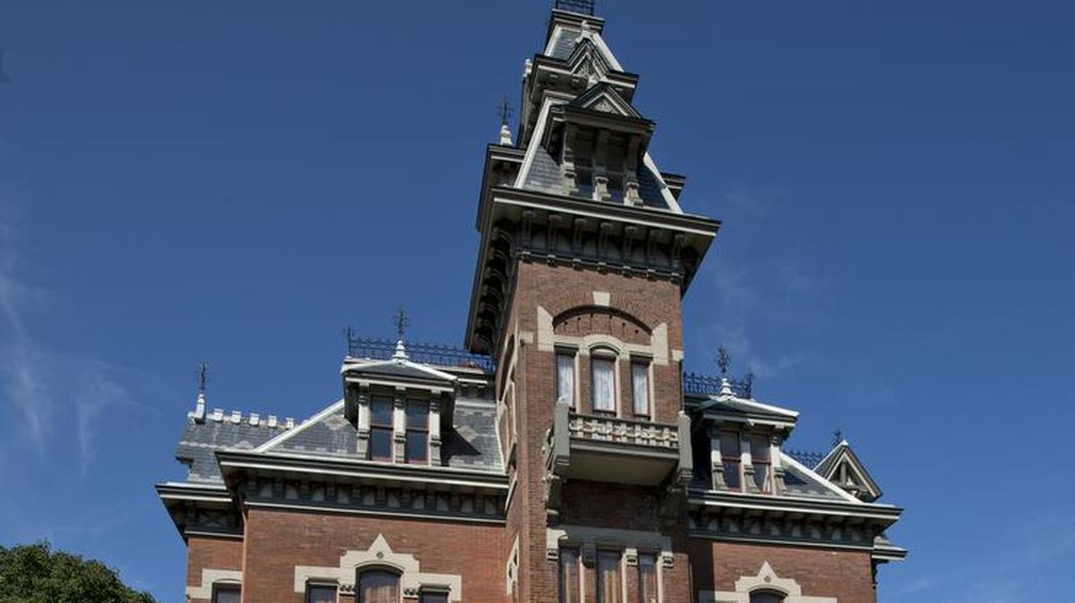
Damaged woodwork around the front entry and porches of the Vaile Mansion at 1500 N. Liberty Street in Independence is being restored. The Second Empire home was built for Harvey M. Vaile in 1881, at a cost of $150,000.