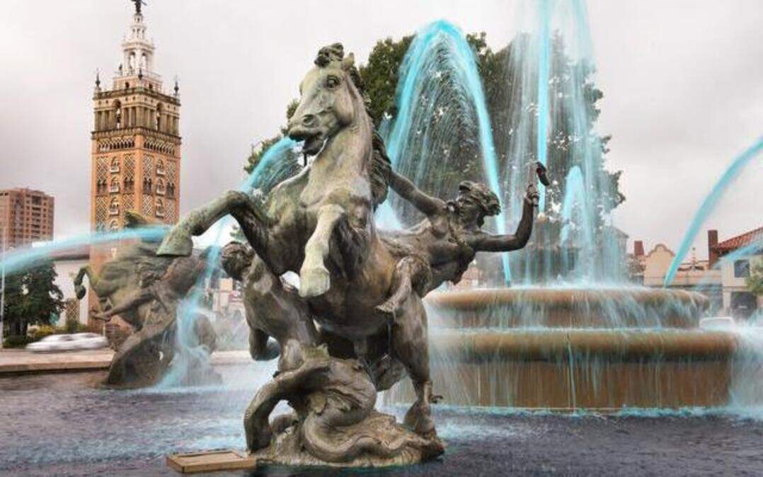
The J.C. Nichols memorial fountain is dyed bright blue to celebrate the Royals making it to the playoffs for the first time in 29 years. It takes about 70 gallons of dye from a local company.
