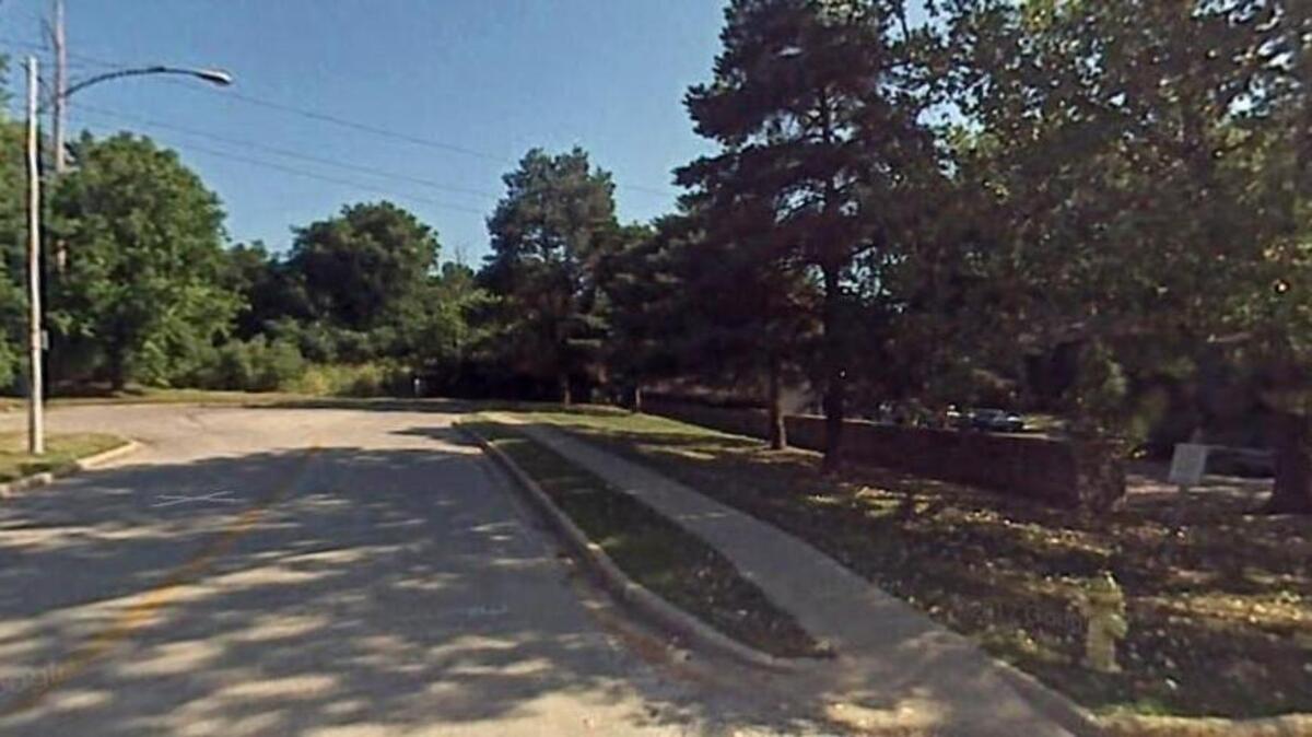 A police officer in North Kansas City was injured after a foot chase and shooting incident Thursday near the 1600 block of Redbud Lane, shown here in a Google Maps image.