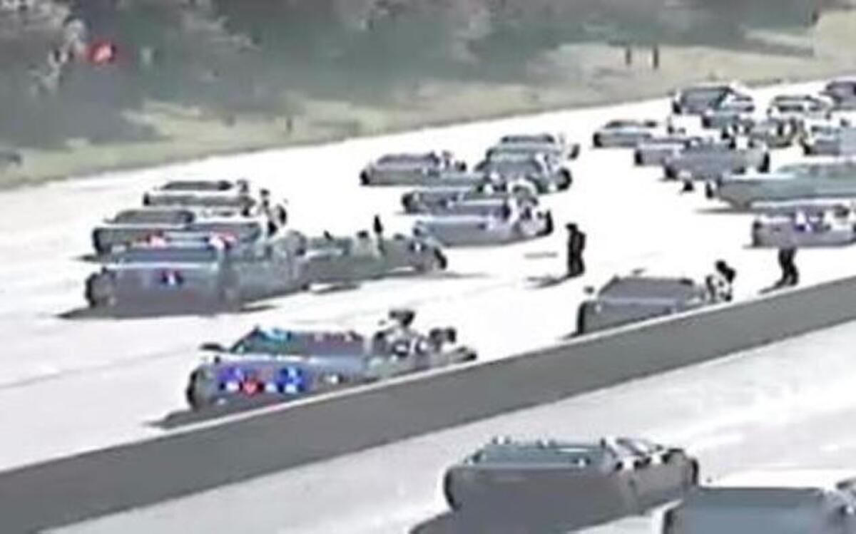 A multiple-vehicle crash and police pursuit is snarling traffic on westbound I-435 in Overland Park.