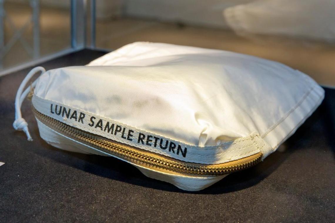 Five strips of Scotch tape impregnanted with moon dust from the fabric of this bag used to collect samples during the first manned lunar landing were the subject of a law suit filed in Kansas City.