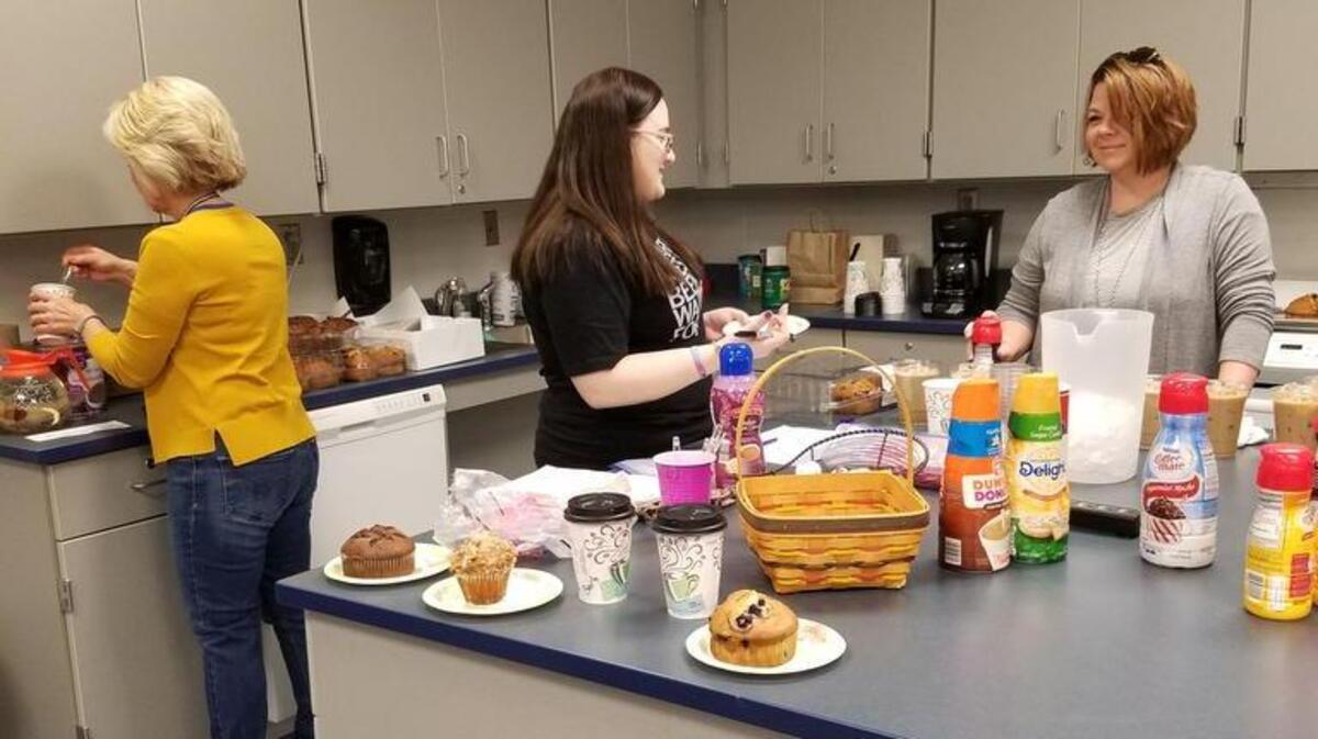 Husky Joe’s Coffee Shop was created by (from left) teachers Pat Appleton, Monica Wyatt and Amy Hansen