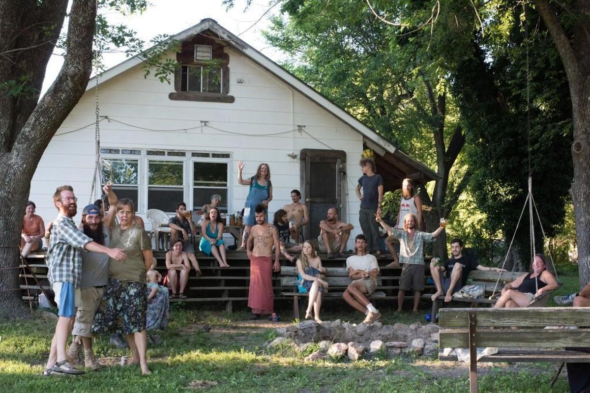 East Winders gathered during a summer solstice party earlier this year that featured a pig roast and blazing bonfire.