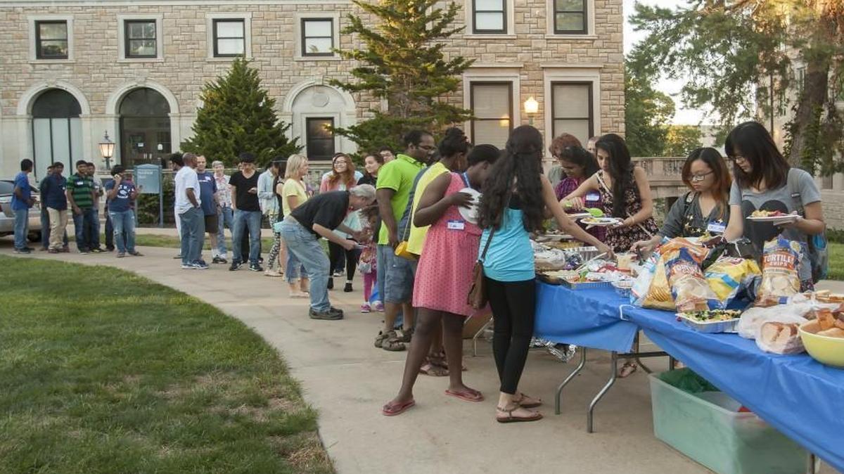 International students on the University of Missouri-Kansas City campus gathered in September 2014 for a potluck supper organized by International Students Inc., a Christian community service organization. This year, the number of foreign students looking to enroll at UMKC dropped by more than half.