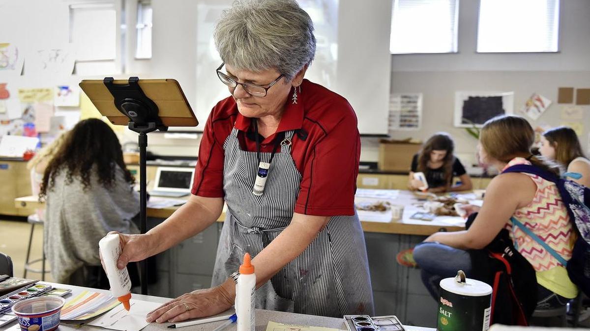 
Teachers say they are determined to work in Kansas schools despite the turmoil over funding and politics. Ruthe Goff, Hocker Grove Middle School’s art teacher, is a lifelong Kansas resident and can’t imagine teaching anywhere else. 
