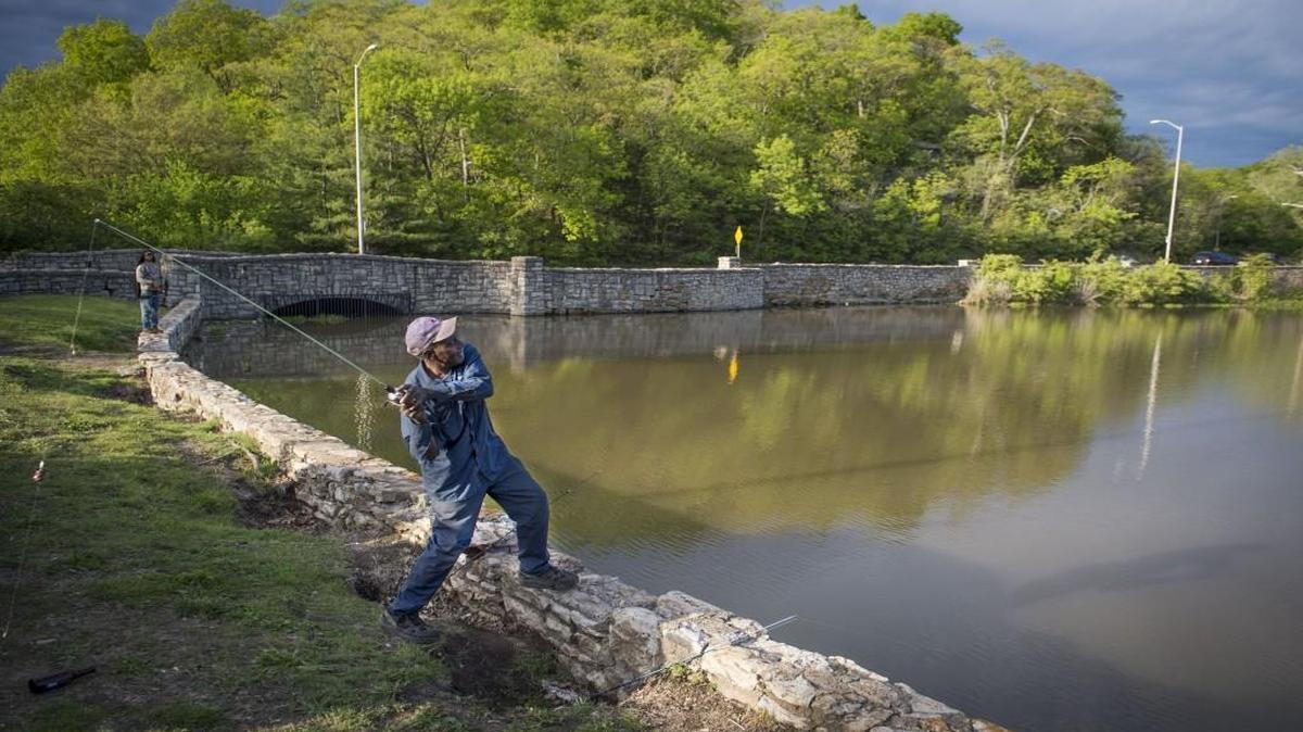 Hubert Nevels of Kansas City prepares to cast a line at Swope Park’s Lake of the Woods.