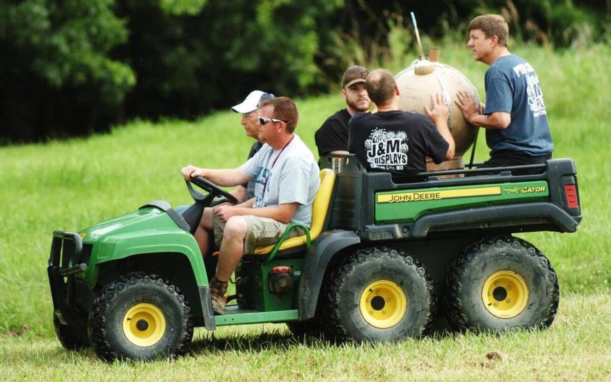 
Members of J&M Displays of Liberty transported a 24-inch shell to a secluded mortar site Friday morning in preparation for Saturday night’s fireworks display at Longview Lake.

