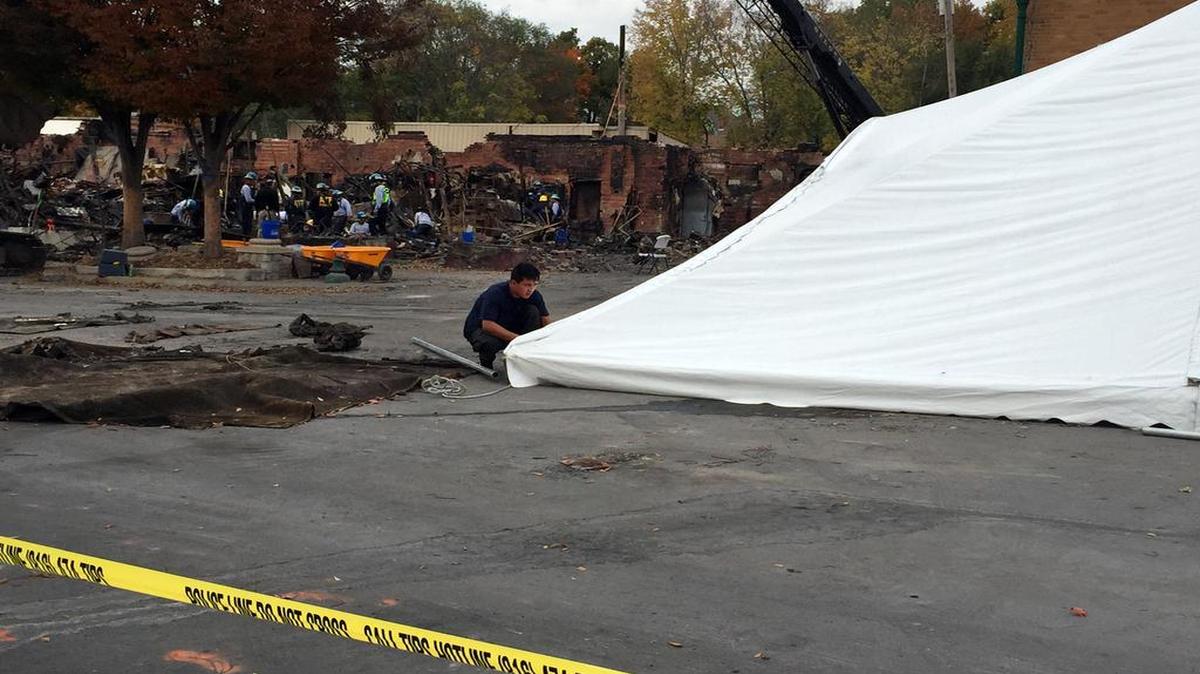 Investigators of the Oct. 12 Independence Avenue fire ordered a large tent Thursday afternoon. Workers were expected to move the tent into the site of the former building, allowing investigators to continue sifting through debris even if wet weather arrives.