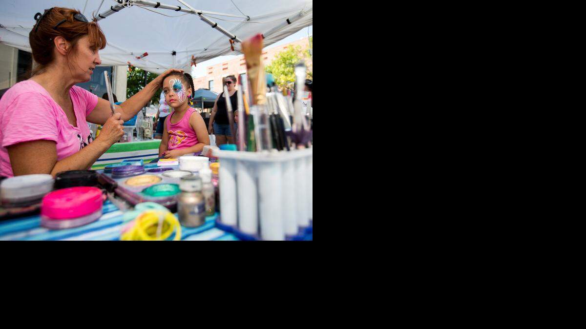 
Young visitors found much to enjoy Sunday at Santa-Cali-Gon Days in Independence, where 3-year-old Jaelyn Nicholson had her face painted by Sonja Ottaway. The festival on Independence Square wraps up today. Go to KansasCity.com for a photo gallery.


