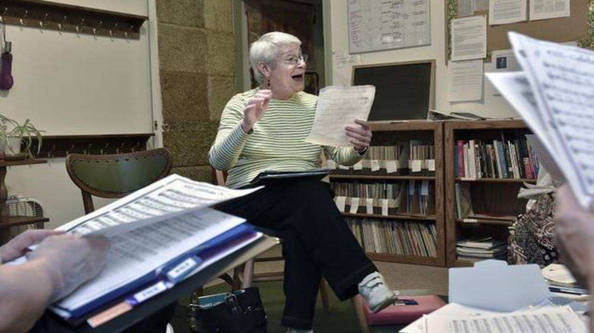 
Members of the Lawrence chapter of the Threshold Choir, including director Jean Drumm, practice at the Oread Friends Meeting House. Threshold Choirs have sprung up across the country, providing singing for those near the end of life, including those in hospice or advanced stages of dementia.
