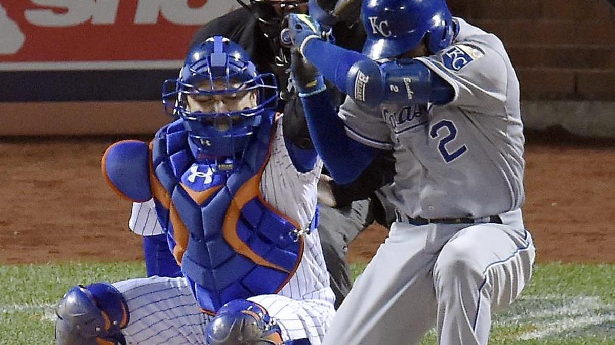 Kansas City Royals shortstop Alcides Escobar ducks to miss the first pitch by New York Mets starting pitcher Noah Syndergaard in the first inning during game three of the World Series on Friday, October 30, 2015 at Citi Field in New York.
