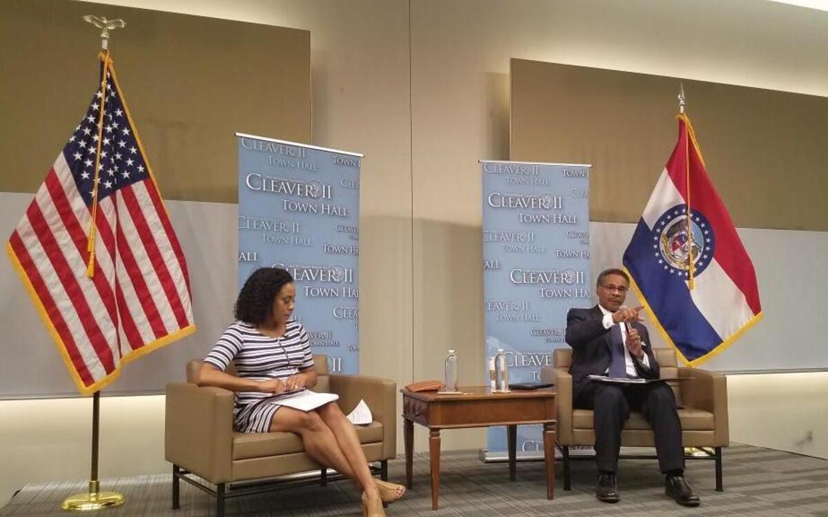 U.S. Rep Emanuel Cleaver (right), a Kansas City Democrat, called on a member of the crowd during a town hall meeting Wednesday at Metropolitan Community College-Penn Valley to discuss the rising cost of college and its related debt for student loan borrowers.