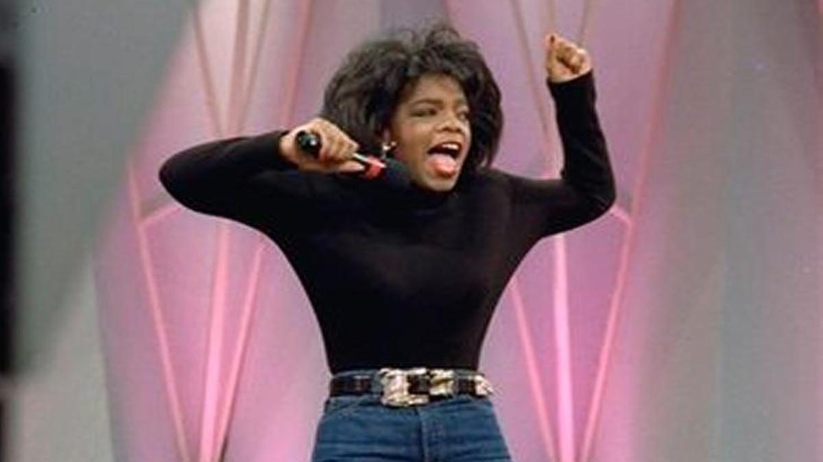 
A Nov. 15, 1988 file photo shows television talk show host Oprah Winfrey showing off her new figure in Chicago after she lost 67 pounds following a liquid diet and exercise. 
