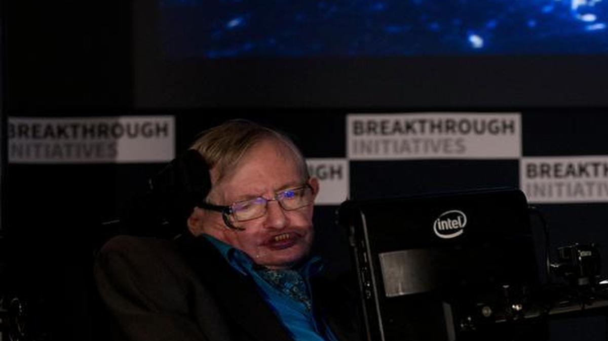 
Stephen Hawking sat in front of a presentation image during a press conference Monday in London. Hawking and Russian tech entrepreneur Yuri Milner are pushing the search for extraterrestrial life into higher gear. 
