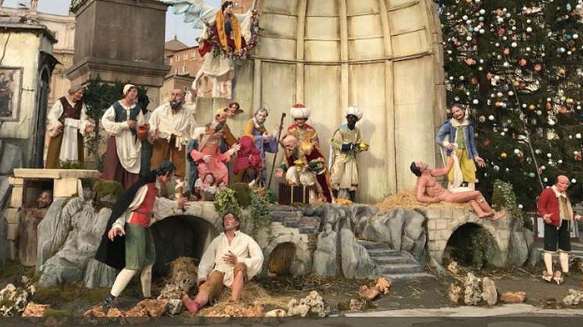 This year’s Nativity at the Vatican in Rome has stirred up a bit of controversy. One of the life-size statues in the scene is a naked man being clothed as an act of mercy.