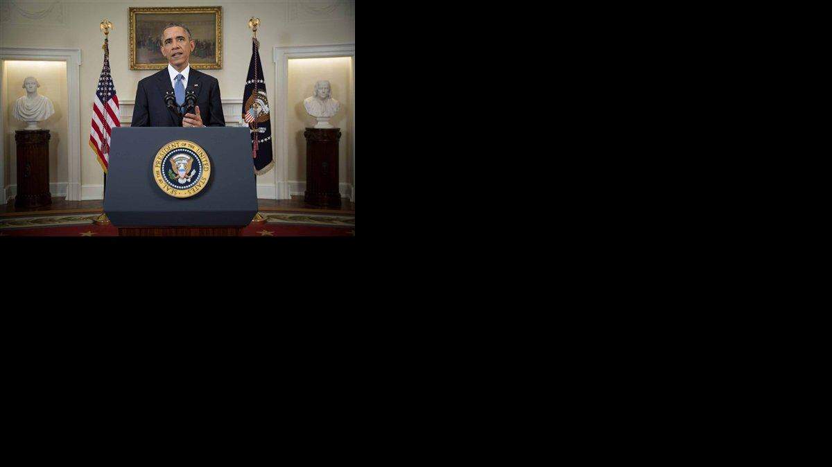 
President Barack Obama speaks in the Cabinet Room of the White House in Washington, Wednesday, Dec. 17, 2014, to announce the U.S. will end its outdated approach to Cuba that has failed to advance U.S. interests. (AP Photo/Doug Mills, Pool)
