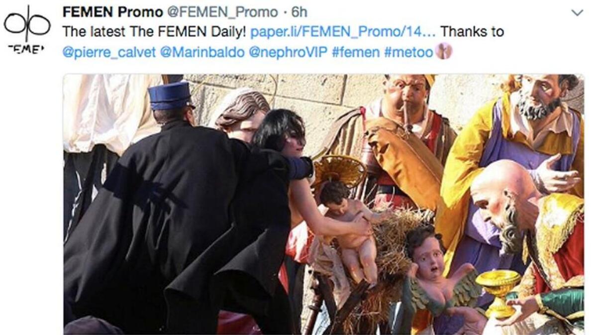 A member of an international feminist organization, wearing only pants and shoes, tried to take the baby Jesus from the Vatican’s nativity scene on Christmas day.