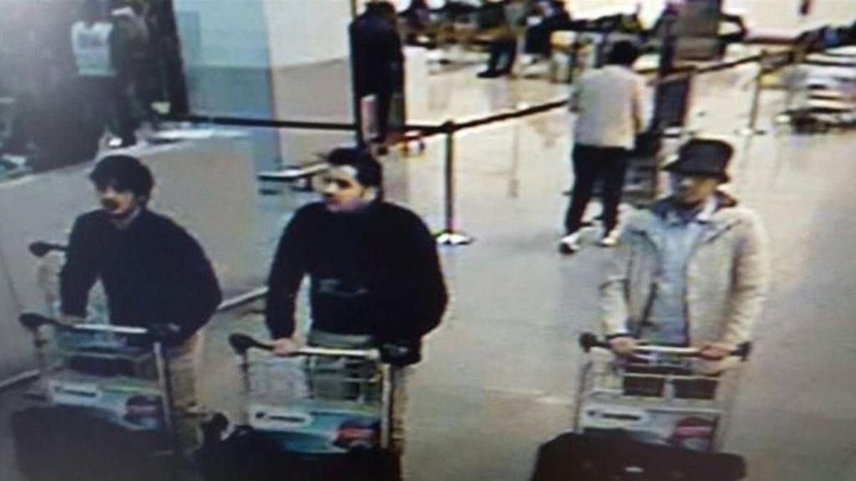 This image provided by the Belgian Federal Police in Brussels on Tuesday shows three men suspected of taking part in the attacks at Belgium’s Zaventem Airport.
