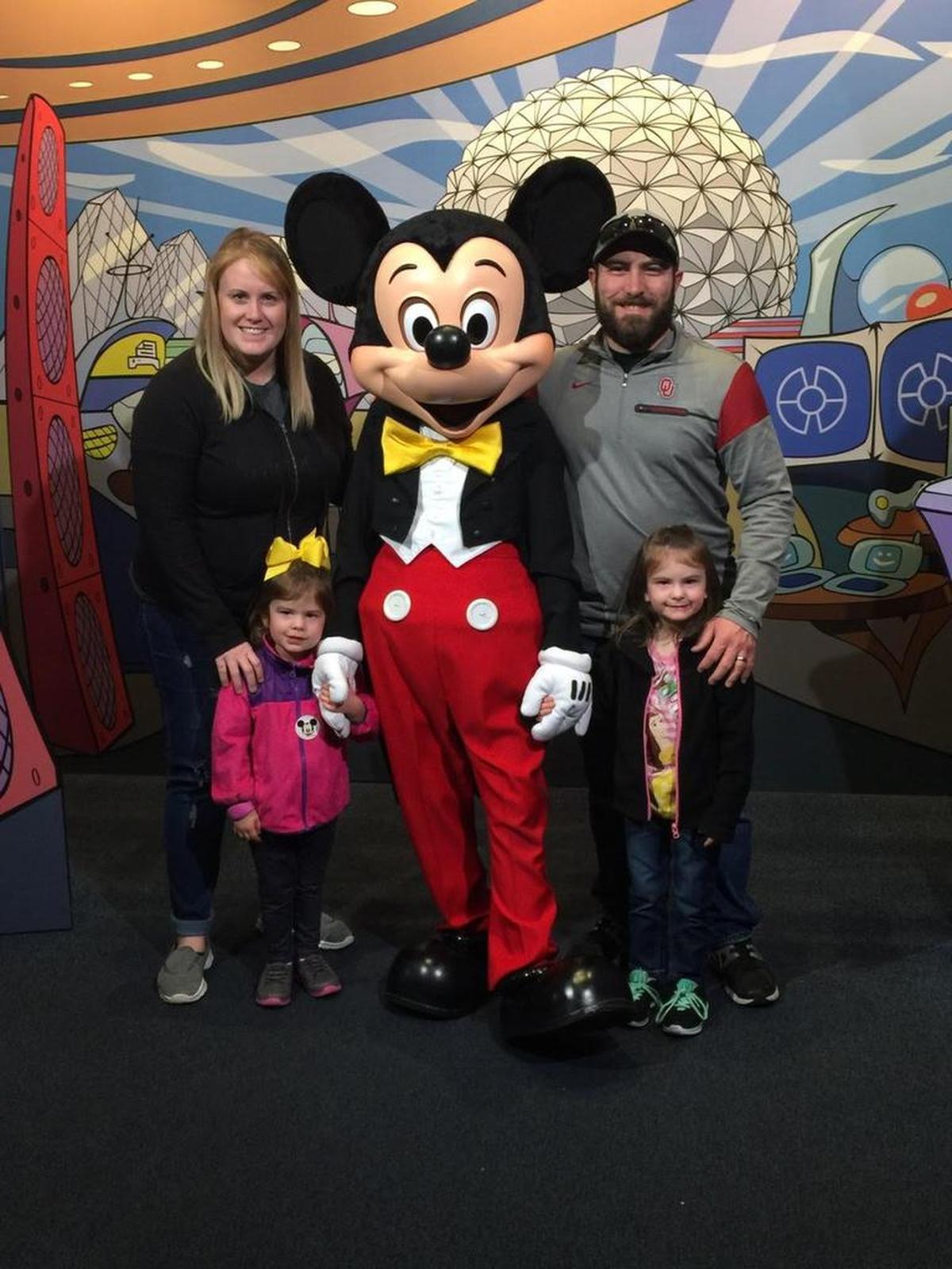 Oklahoma youth pastor Joe Vaughn and his wife, Andrea, and their daughters, Tinlee, right, and Brynlee, just spent at week at Disney World. On the way home, the girls went viral when they danced with an airport employee in Dallas. That’s Mickey Mouse in the middle.