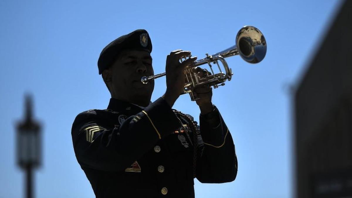 Students in Minnesota protested by sitting down during “Taps” on Veterans Day, prompting a response by their conservative counterparts that has led to a federal free-speech lawsuit.