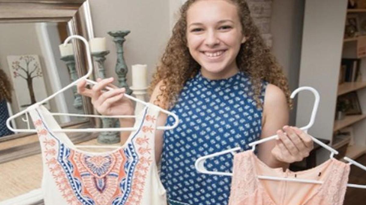 A high school in Wisconsin that has been requiring girls to submit photos of their homecoming dresses to school officials ahead of the dance has softened its policy after backlash.