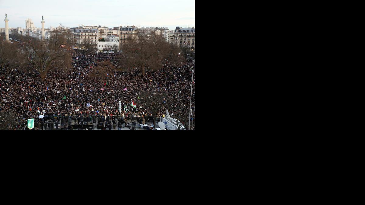 
People gather in Paris during a unity rally on Sunday in tribute to the 17 victims of a three-day killing spree by homegrown Islamists. 
