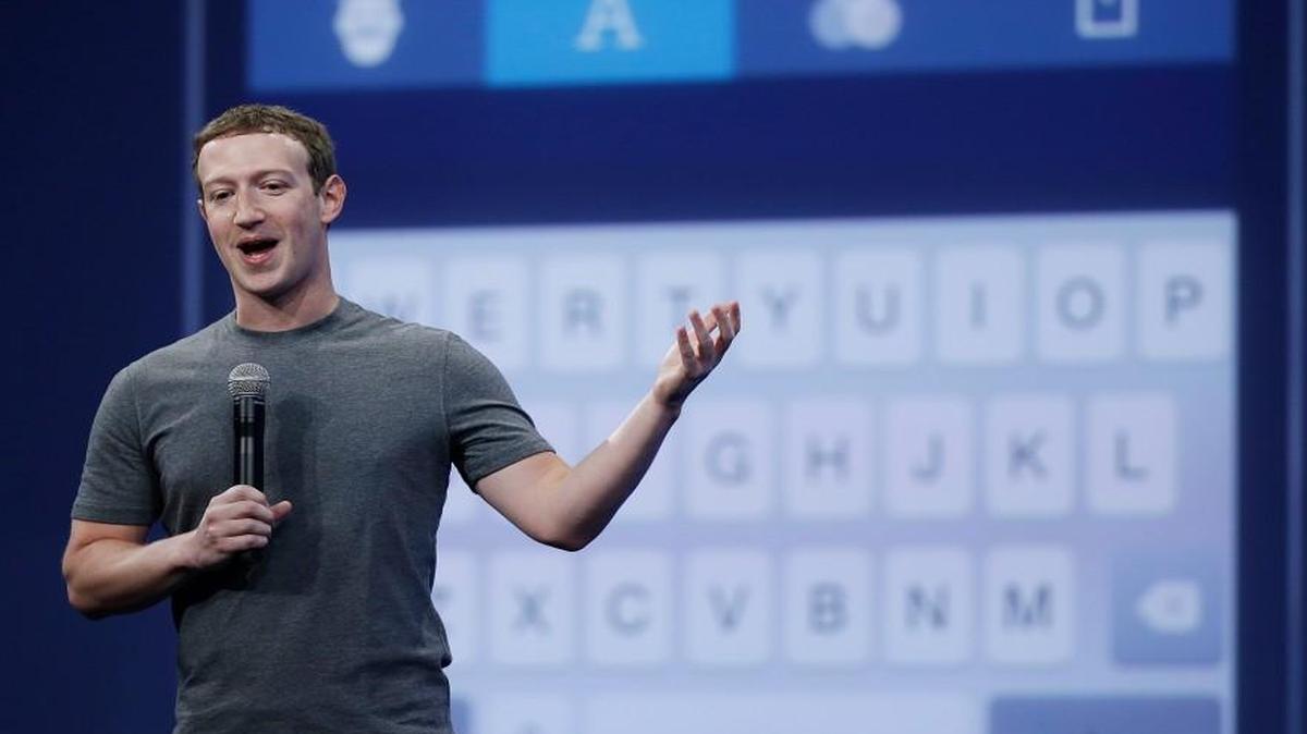 
In this March 25, 2015 file photo, Mark Zuckerberg talks about the Messenger app during the Facebook F8 Developer Conference in San Francisco. For the first time, a billion people used Facebook in a single day on Monday, Aug. 24.
