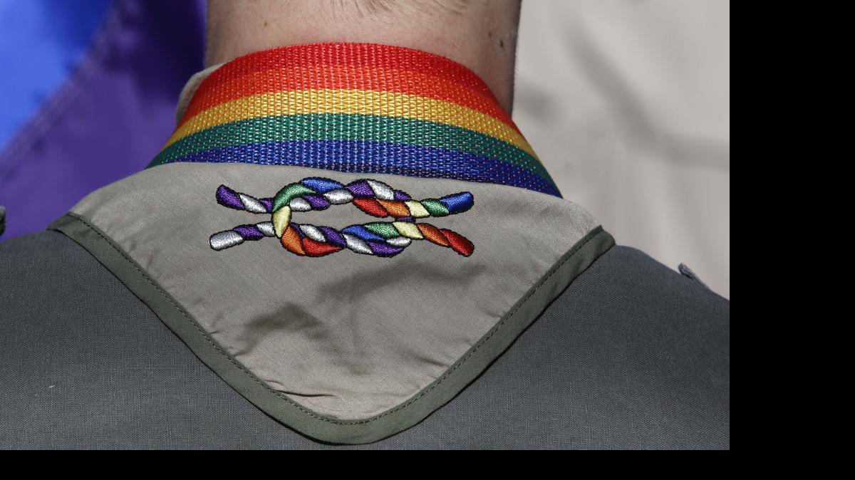 
A Boy Scout wore his kerchief embroidered with a rainbow knot during Salt Lake City’s 2014 gay pride parade. The Boy Scouts of America’s top policymaking board planned a vote Monday on ending its blanket ban on gay adult leaders while allowing church-sponsored Scout units to maintain the exclusion if that accorded with their faith. 
