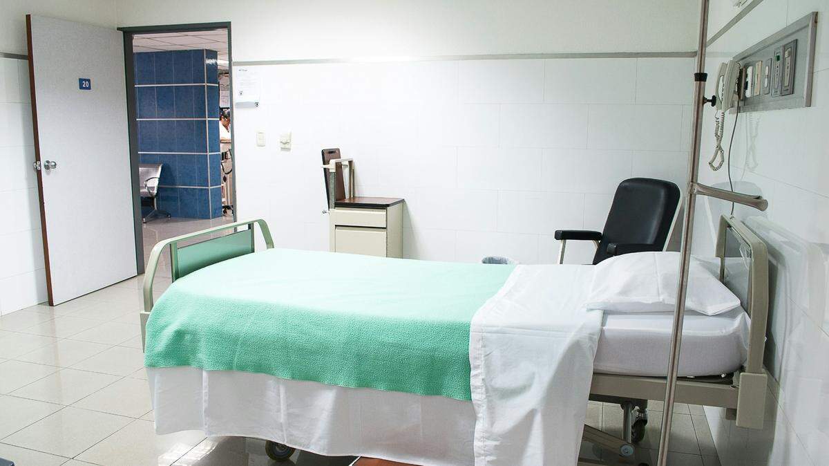 A woman is charged with attempted murder in the death of a woman at a treatment facility, police say.