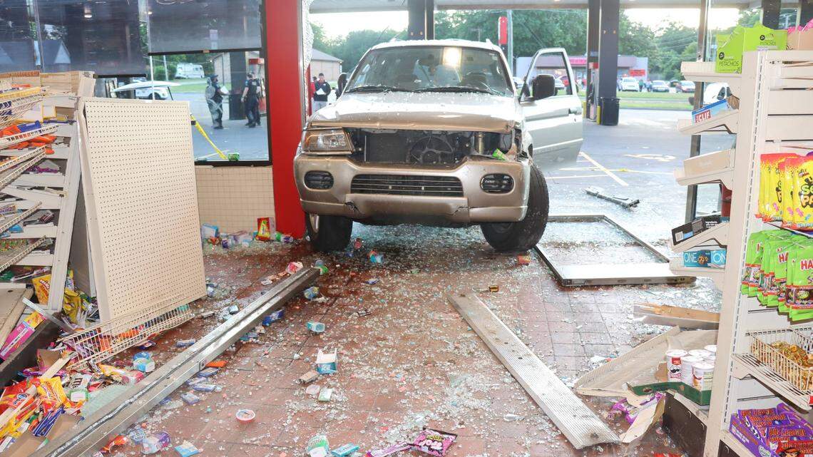 The customer went inside QuikTrip so employees could call the cops before Ashley Blackmon drove into the building, Tulsa police said.