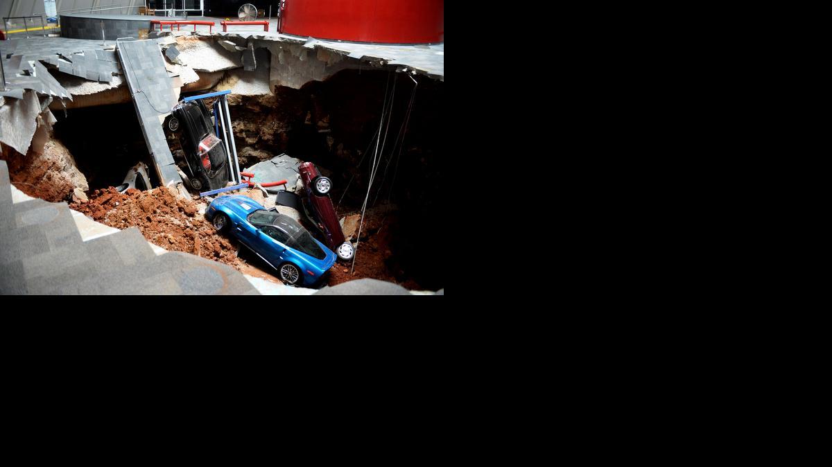 
Cars lie in a sinkhole that opened up at the Skydome showroom in the National Corvette Museum in Bowling Green, Ky. 
