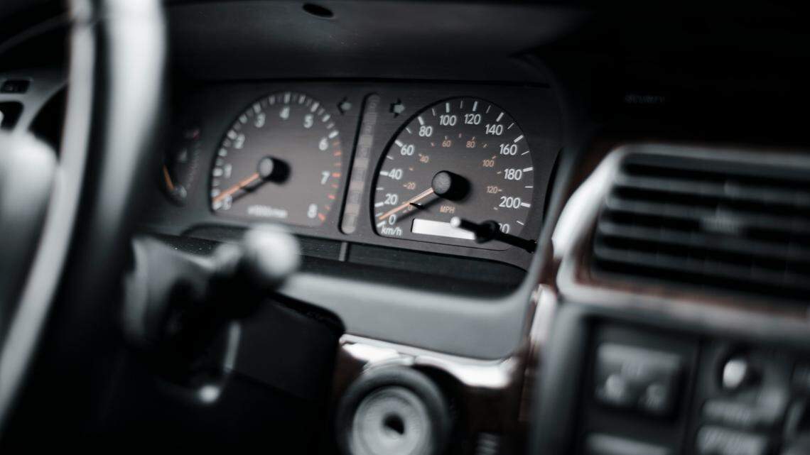 An Ohio car dealer adjusted the mileage on eight vehicle odometers then sold them, officials said.