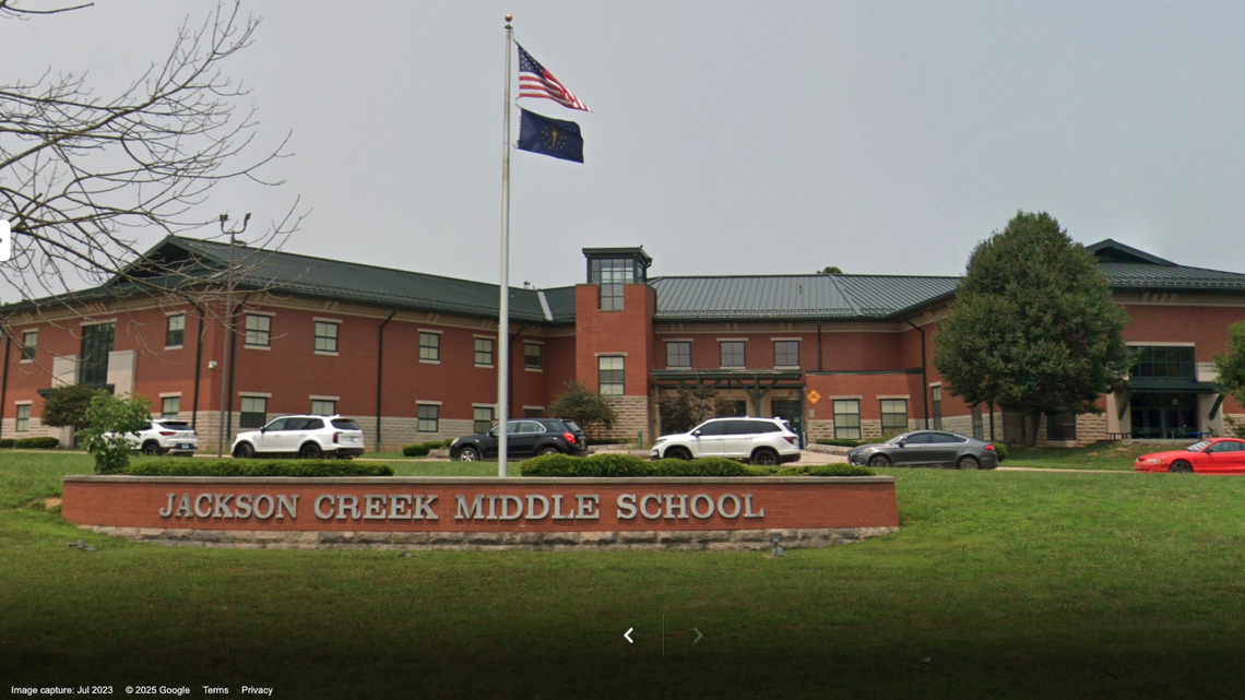 A former teacher’s aide at Jackson Creek Middle School was arrested after accusations that he assaulted a special-needs student.