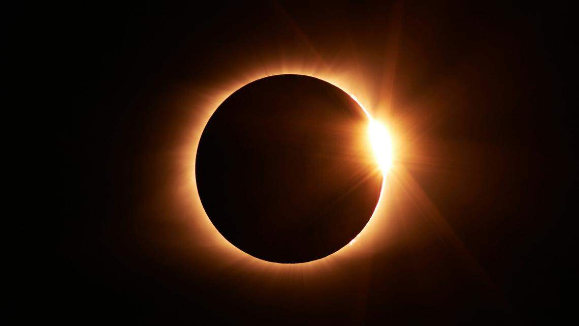 A 70-year-old woman was shot on her arm while on her front porch during the solar eclipse, Indiana authorities say.