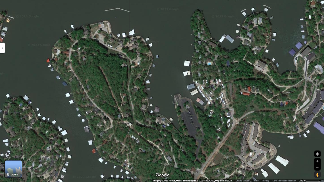 A woman drowned at the Lake of the Ozarks while backing her boat into the water, Missouri cops say.