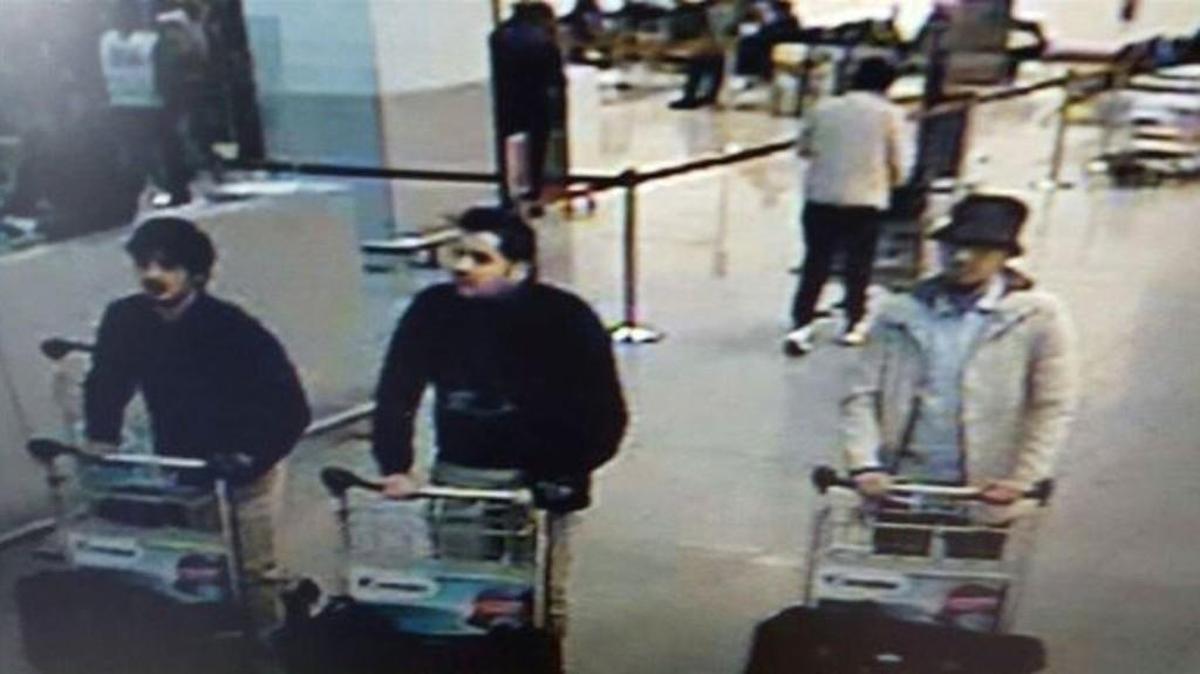 In this image provided by the Belgian Federal Police in Brussels on Tuesday, March 22, 2016, three men who are suspected of taking part in the attacks at Belgium's Zaventem Airport and are being sought by police.