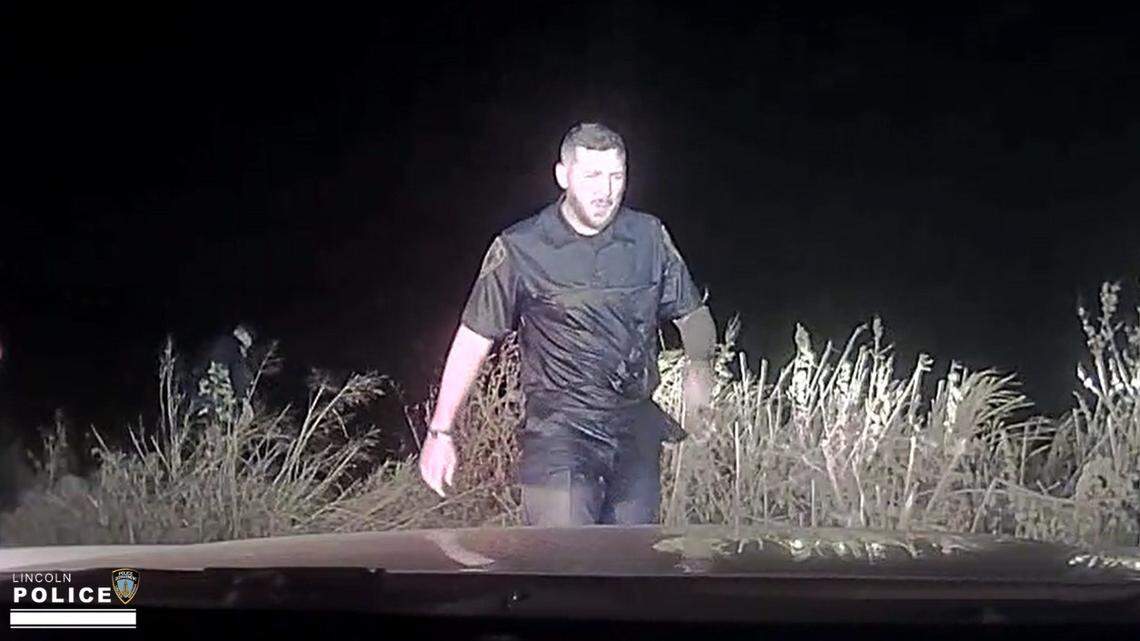 A police officer saved a drowning woman “screaming for help” after her kayak capsized, Nebraska officials said.