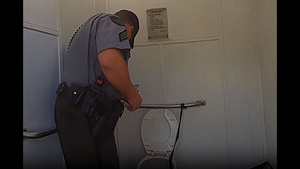 A woman got stuck inside an outhouse toilet after dropping her Apple Watch inside.