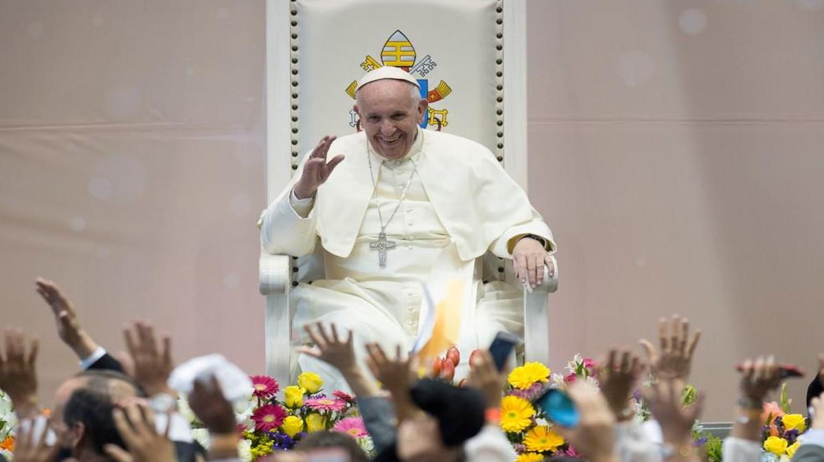 Pope Francis salutes faithful during his meeting with workers and advocacy groups in Ciudad Juarez, Mexico, on Wednesday.