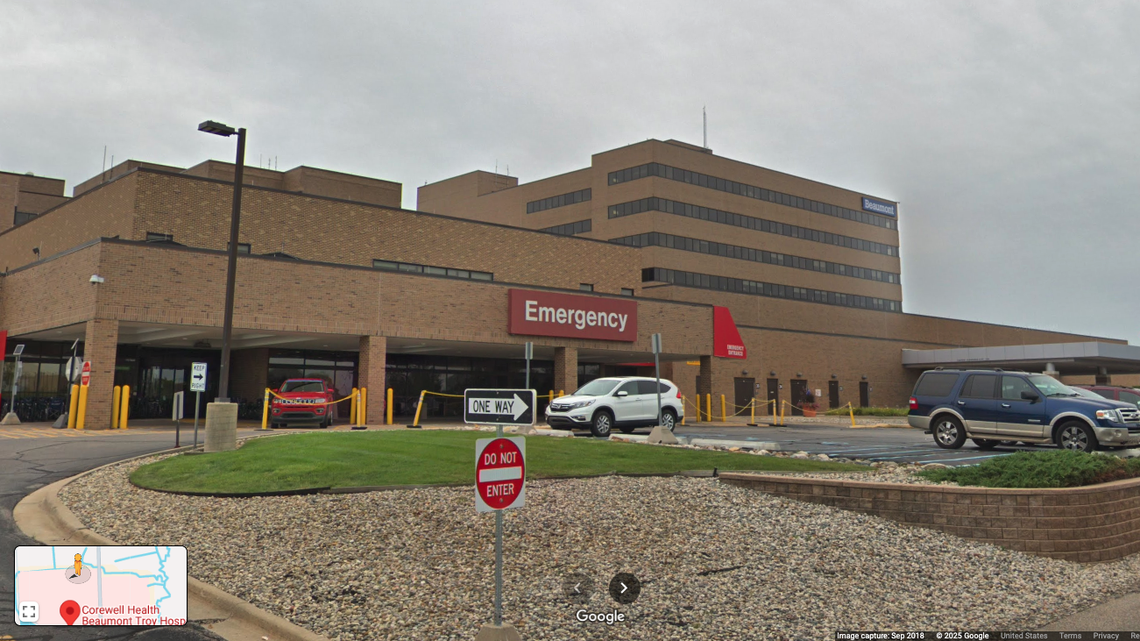 A man shot his co-worker in the parking garage of a Michigan hospital, authorities say.